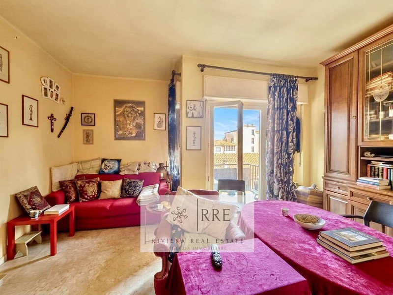 Restored apartment in San Lorenzo al Mare, living room with balcony access