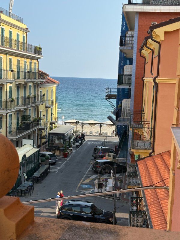 View of the sea from a street in Borgo Coscia, Alassio